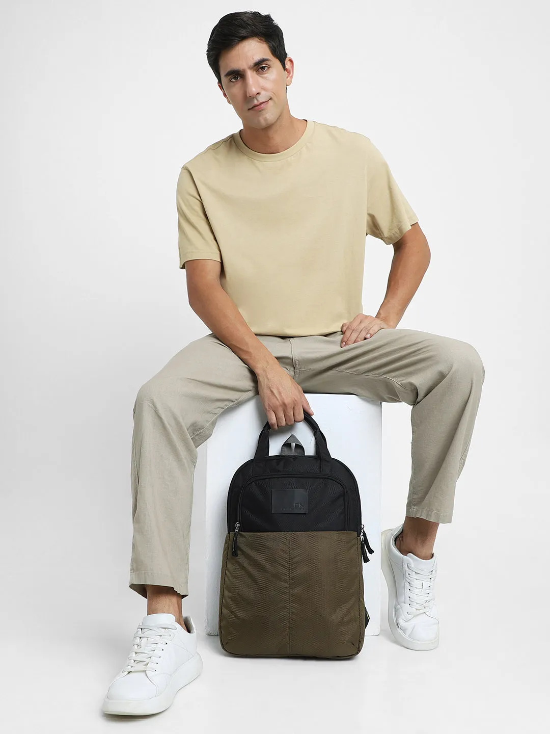 Men's Black & Olive Water Repellent Travel Backpack with adjustable shoulder strap